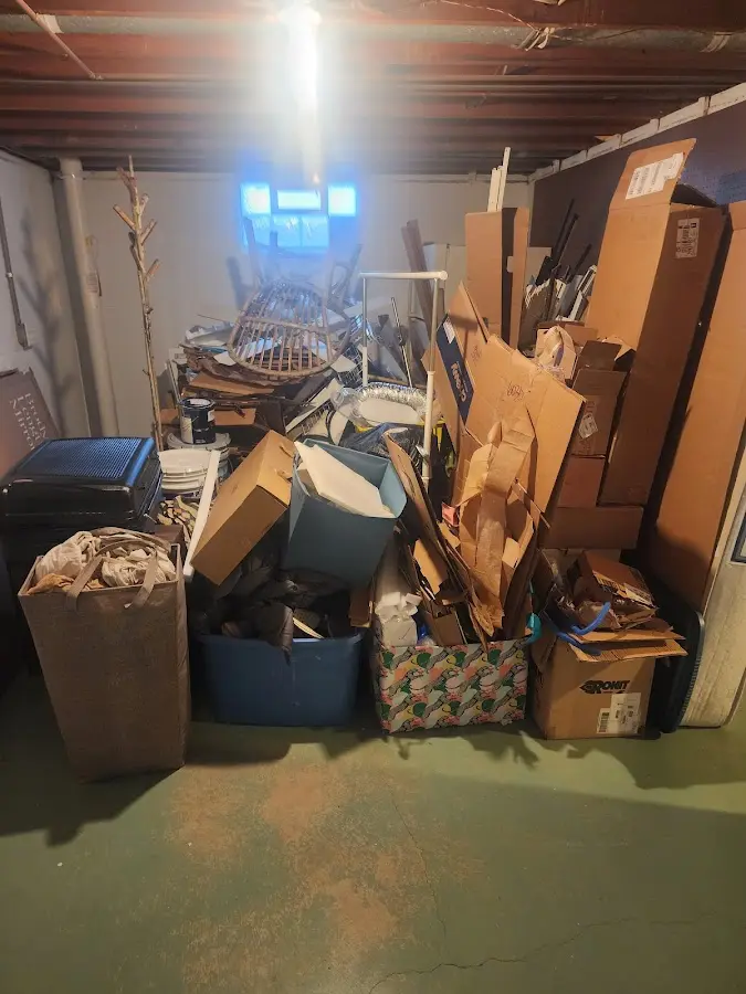 Roll-off dumpster container at job site for 4 Yard Dumpster Rental in Manchester